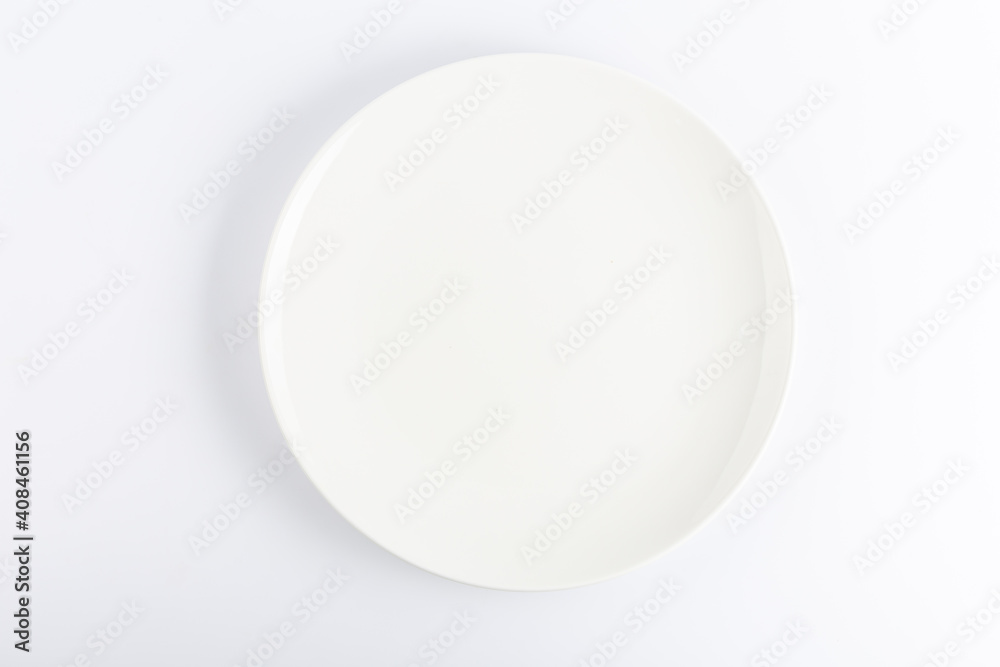 Empty ceramic round plate isolated on white background Empty ceramic round plate isolated on white background