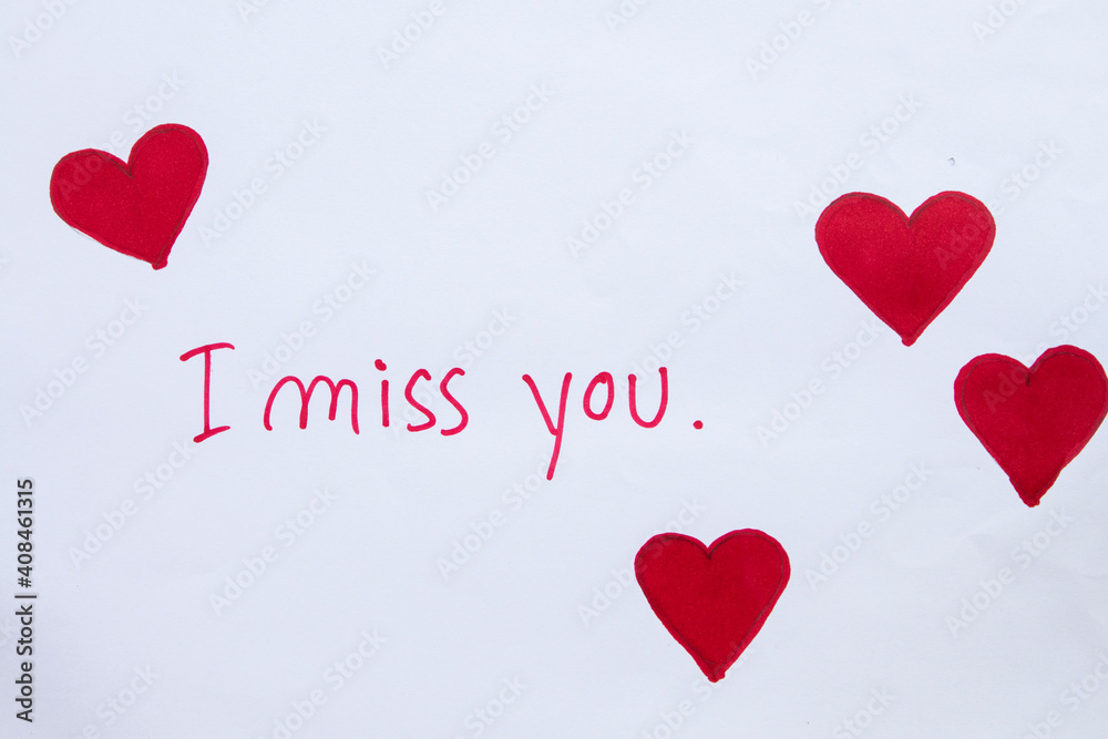i miss you message card handwriting with red heart draw in valentine on paper white