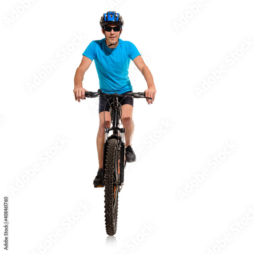 Young athletic sportsman riding bicycle on white background, men's health and cycling, physical activity in middle age