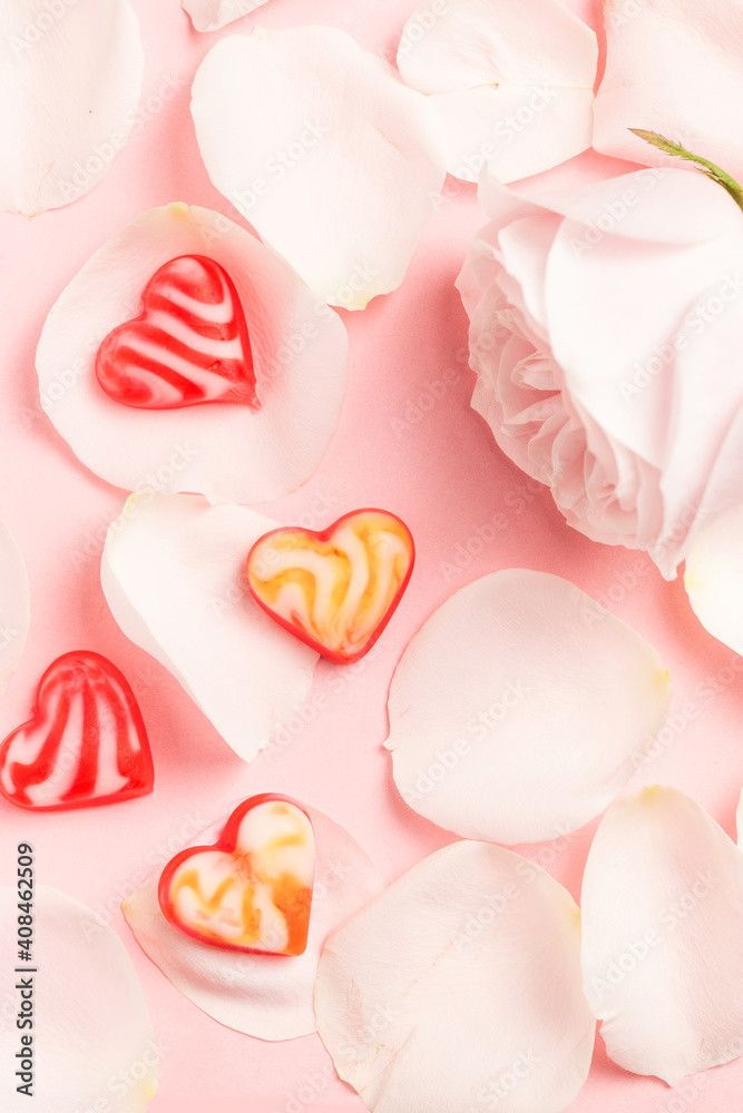 Roses and heart-shaped candy bars Roses and heart-shaped candy bars