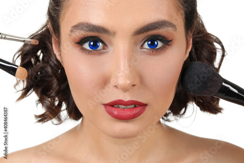 Beautiful young woman with ...