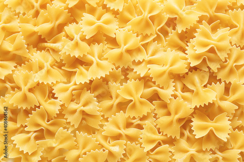 Dry pasta as background, top view