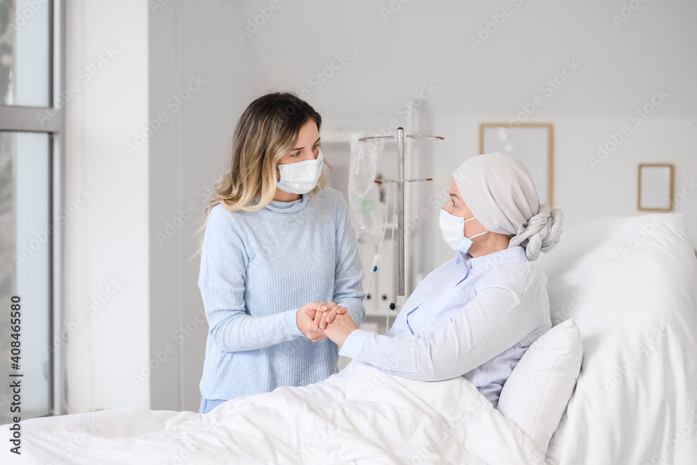 Daughter visiting her mother in clinic Daughter visiting her mother in clinic