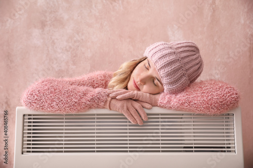 Young woman in warm clothes...