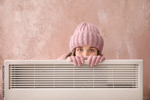 Young woman in warm clothes...