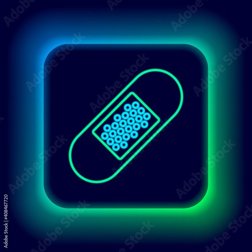 Glowing neon line Bandage plaster icon isolated on black background. Medical plaster, adhesive bandage, flexible fabric bandage. Colorful outline concept. Vector.
