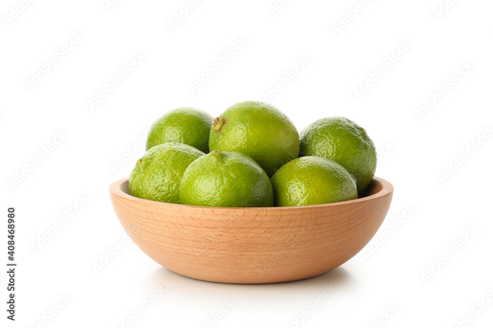 Bowl with ripe lime isolated on white background Bowl with ripe lime isolated on white background