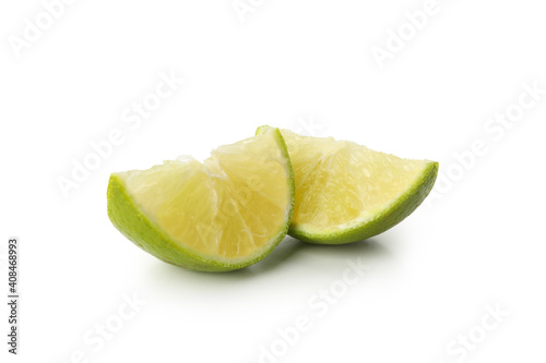 Ripe lime slices isolated on white background