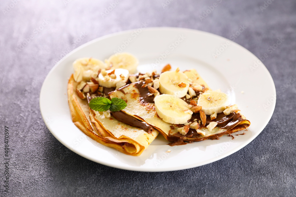 crepe with chocolate and banana with nuts crepe with chocolate and banana with nuts