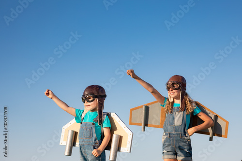 Happy children playing outdoor in summer