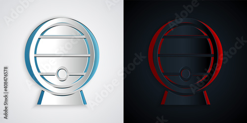 Paper cut Wooden barrel on rack with stopcock icon isolated on grey and black background. Paper art style. Vector.