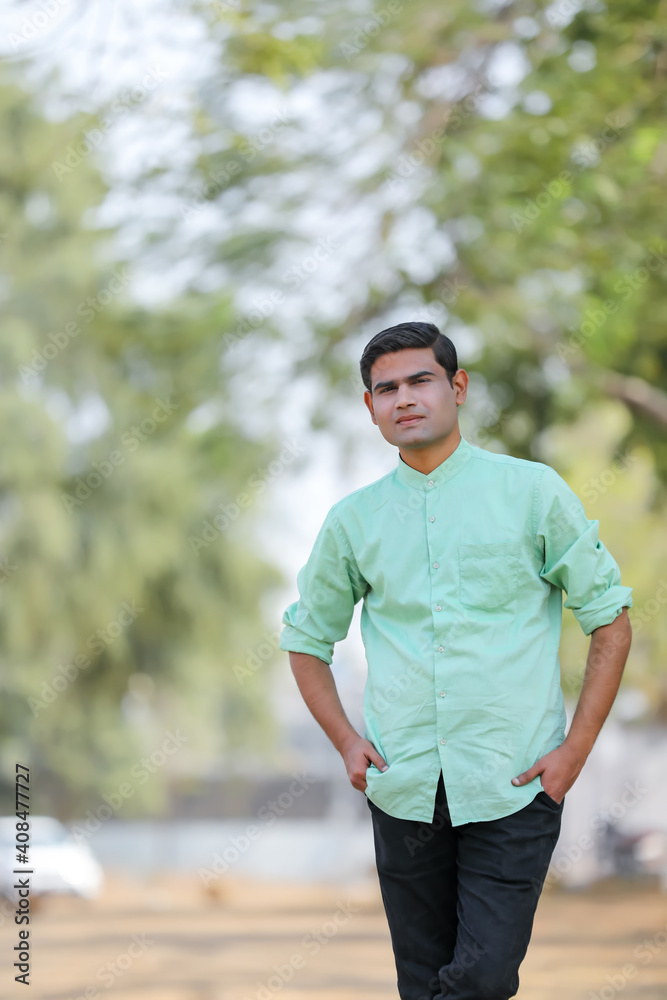 Young handsome indian man giving expression Young handsome indian man giving expression