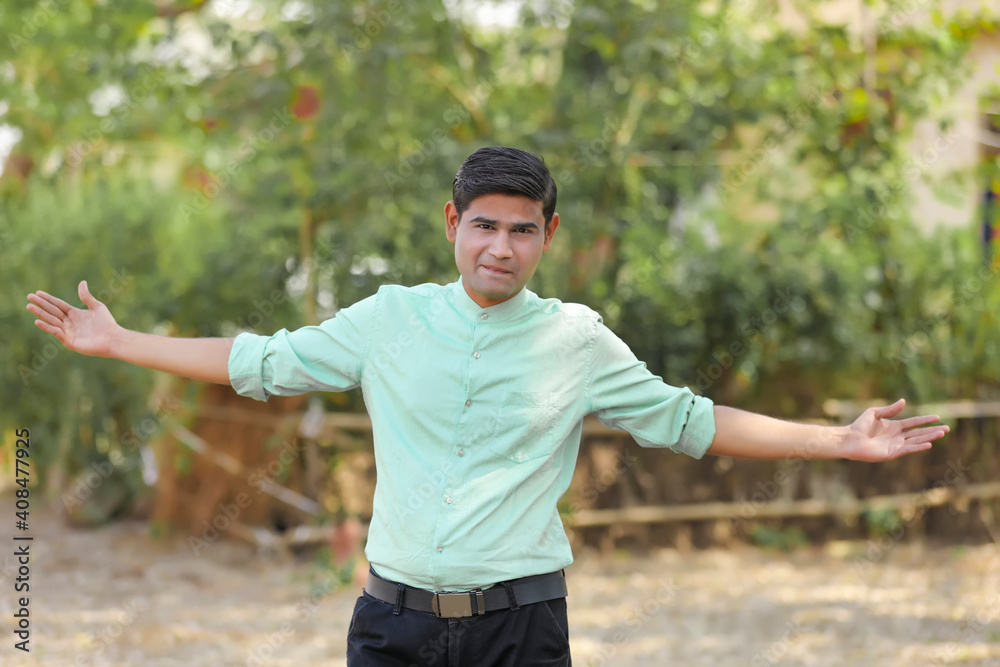 Young handsome indian man giving expression Young handsome indian man giving expression