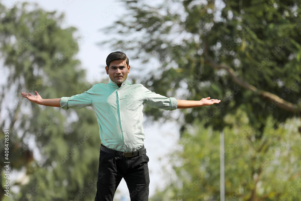 Young indian man Jump in air after achieving success. Young indian man Jump in air after achieving success.