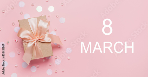Gifts on pink background, love and valentine concept with text 8 march © Daria Lukoiko