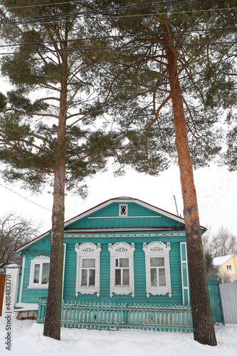 Vintage wooden rural house with ornamental windows, carved frames in Nerekhta town, Kostroma region, Russia. Russian folk style in architecture. Russian village. Nerekhta architectural landmark, sight photo