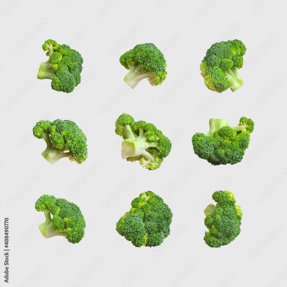 Fresh raw green broccoli isolated on gray background. Collection of broccoli in different shapes. Healthy vegetables, diet vegan organic food, vitamins, cooking ingredient. Broccoli abstract pattern Fresh raw green broccoli isolated on gray background. Collection of broccoli in different shapes. Healthy vegetables, diet vegan organic food, vitamins, cooking ingredient. Broccoli abstract pattern
