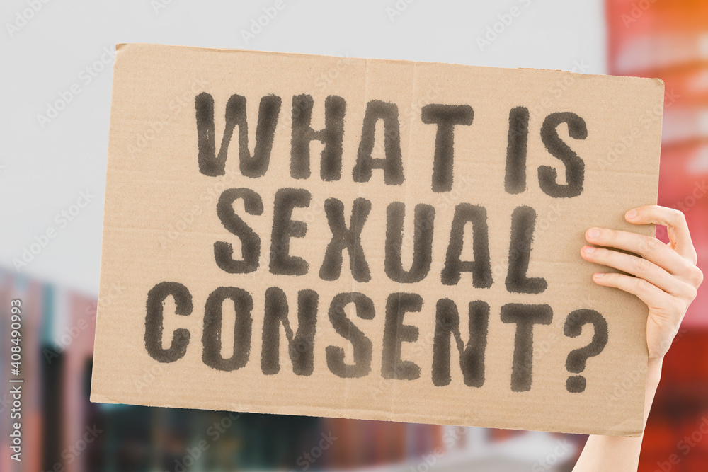 The Question What Is Sexual Consent On A Banner In Mens Hand With Blurred Background 3869