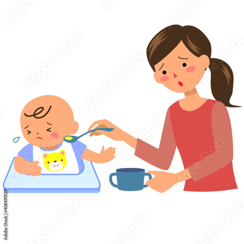 離乳食を嫌う男の赤ちゃんと母親