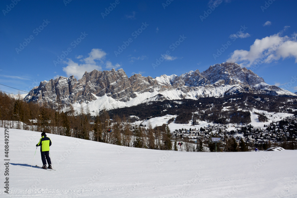 skiers on the slopes in Cortina D'Ampezzo with Monte Cristallo in the background