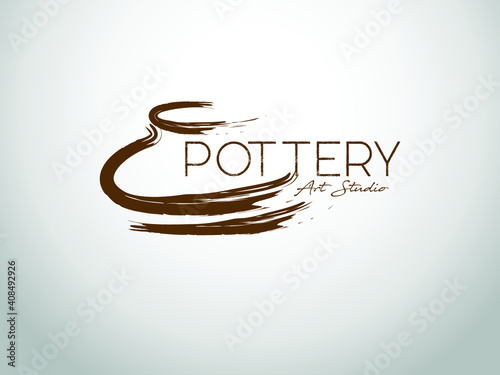 Pottery Art Studio logo with brush strokes in brown color