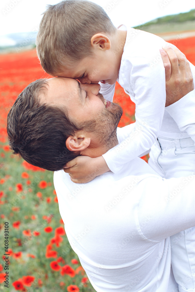 Son and father in nature. The family has fun outdoors. High quality photo. Son and father in nature. The family has fun outdoors. High quality photo.
