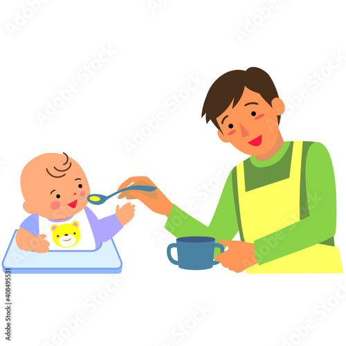 男の赤ちゃんに離乳食を食べさせる父親