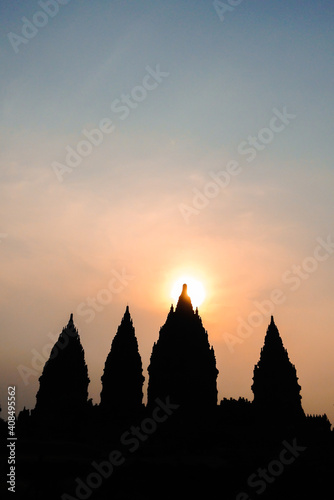 Silhouette of the ancient Prambanan temple complex at sunset.