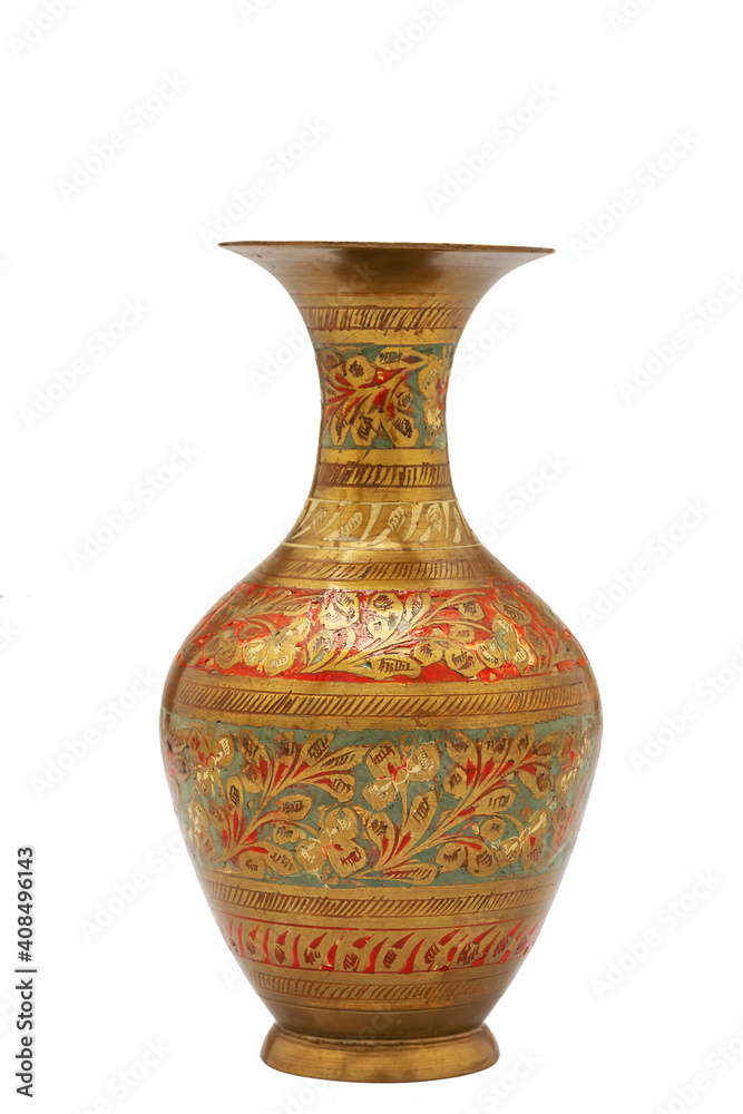 metal oriental vase with engraved texture pattern isolated on a white background metal oriental vase with engraved texture pattern isolated on a white background