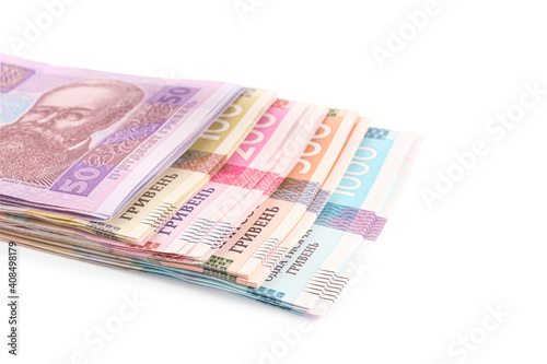 Ukrainian money on white background, closeup. National currency © New Africa