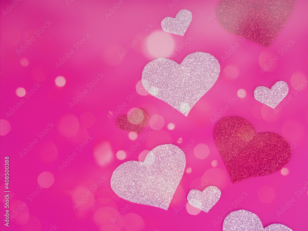 Valentine's Day concept, silver and red heart on pink background, greeting card