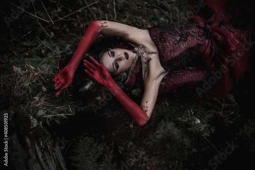 Dark fairy in the forest