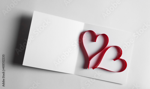 Postcard with hearts on white background.14 February Valentine's day.Copy space.