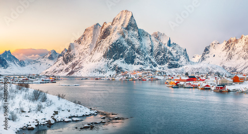 Fantastic evening panorama of Reine town.