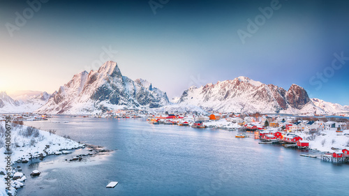 Fantastic evening panorama of Reine town.