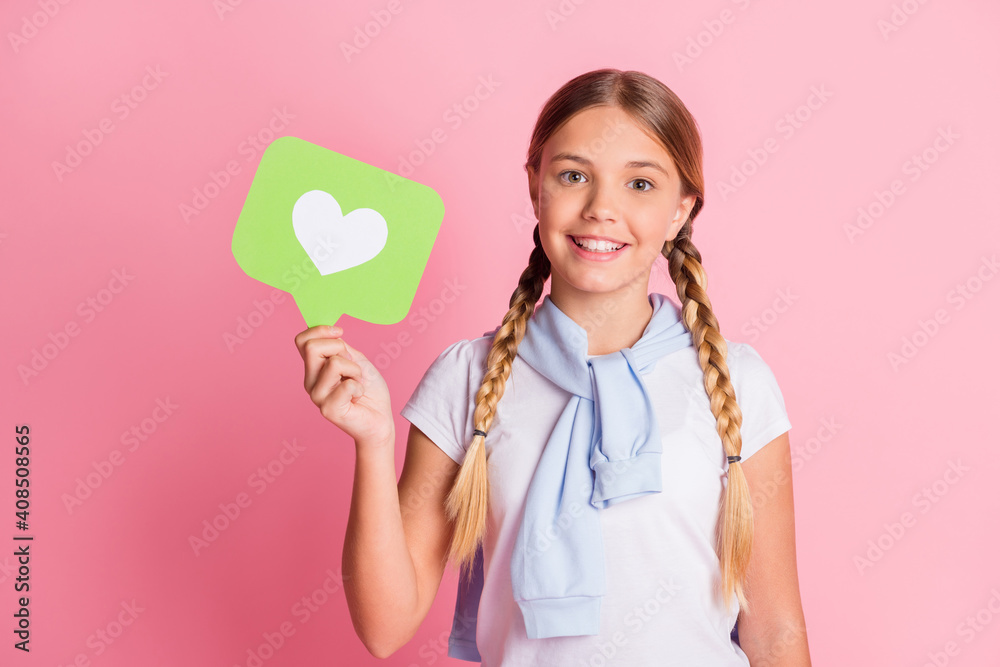Photo of optimistic girl show like wear white t-shirt sweater isolated on pink color background Photo of optimistic girl show like wear white t-shirt sweater isolated on pink color background