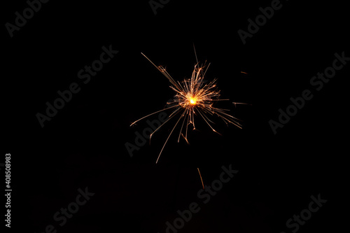 sparklers  bengal fire burns on a black background