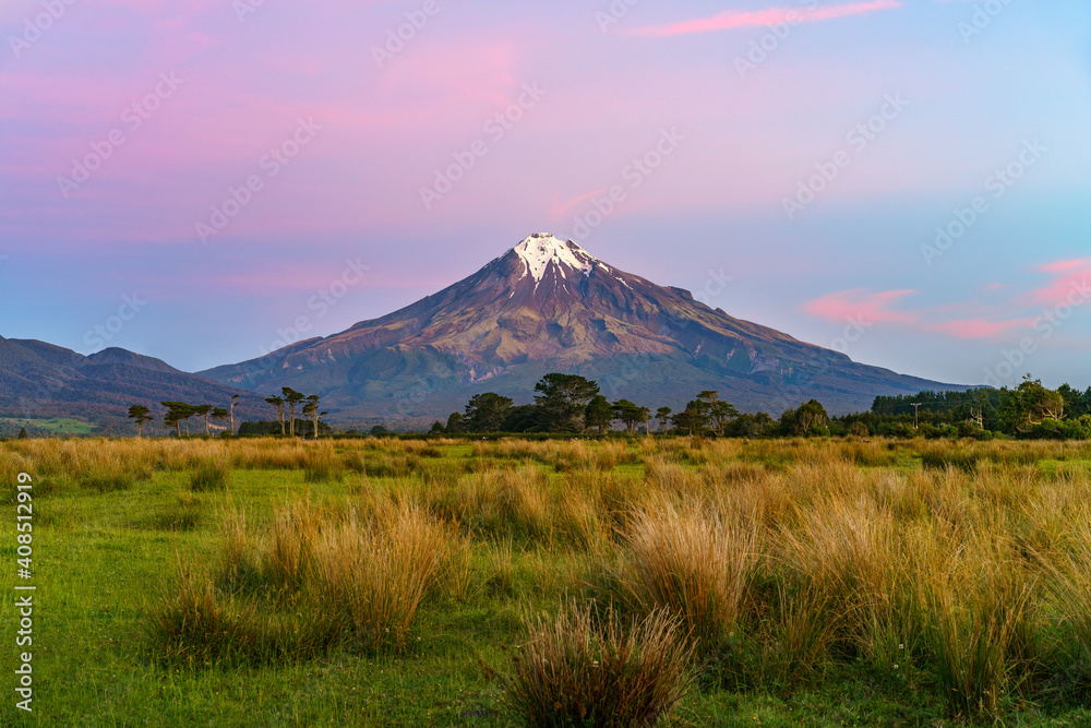 sunset at cone volcano mount taranaki, new zealand