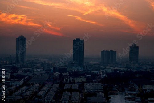 panoramic high-angle evening background of the city view with natural beauty and blurred sunsets in the evening and the wind blowing all the time showing the distribution of city center accommodation