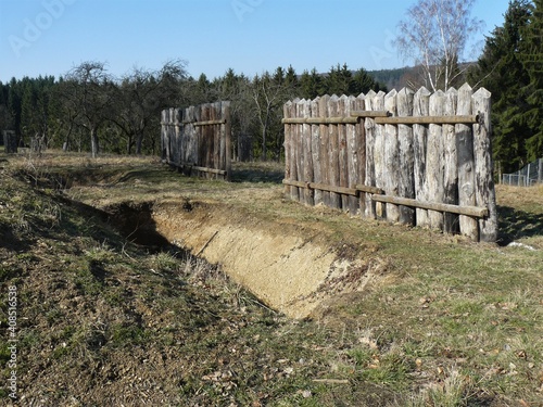 Rekonstruierte Limespalisade mit Wall und Graben bei Römerturm WP 1/8 in Rheinbrohl am Rhein photo