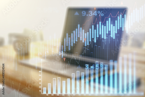 Multi exposure of abstract financial graph and modern desktop with pc on background  financial and trading concept