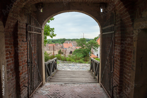 Panorama of the city of petrovaradin near Novi Sad, in Serbia, with the Roofs of typical old Austro-Hungarian style residential houses and building seen from the medieval gate of petrovaradin fortress photo
