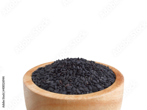 Detailed of, Black sesame kernels in wooden bowl (Macro shot) with copy space.