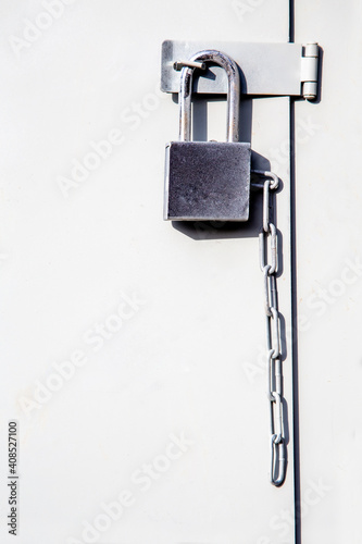 light gray background with padlock, space for text, copy space
