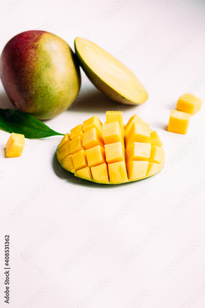 Ripe mango on a white background.