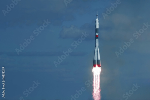 Launch of a space rocket into space. Against the background of the sky. Elements of this image were furnished by NASA.