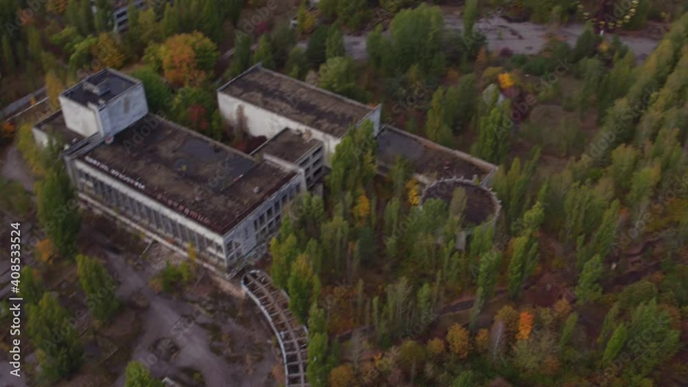Aerial view of Pripyat town. The ghost town in northern Ukraine after the Chernobyl disaster
Panoramic view of Pripyat Ferris wheel and abandoned houses. Chernobyl Exclusion Zone Aerial view of Pripyat town. The ghost town in northern Ukraine after the Chernobyl disaster
Panoramic view of Pripyat Ferris wheel and abandoned houses. Chernobyl Exclusion Zone