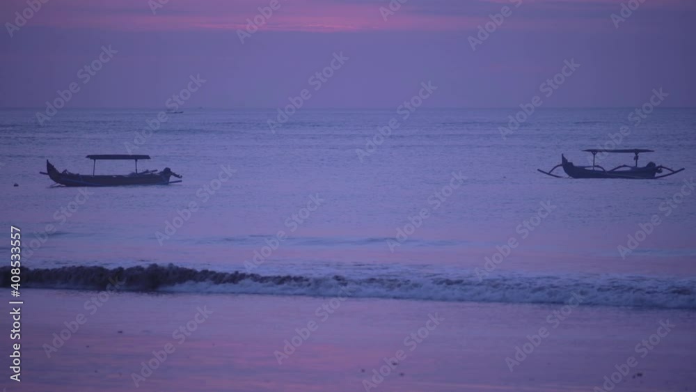 Asian fishing boats on ocean waves in twilight time.
Asian fishing boats on ocean waves in twilight time.