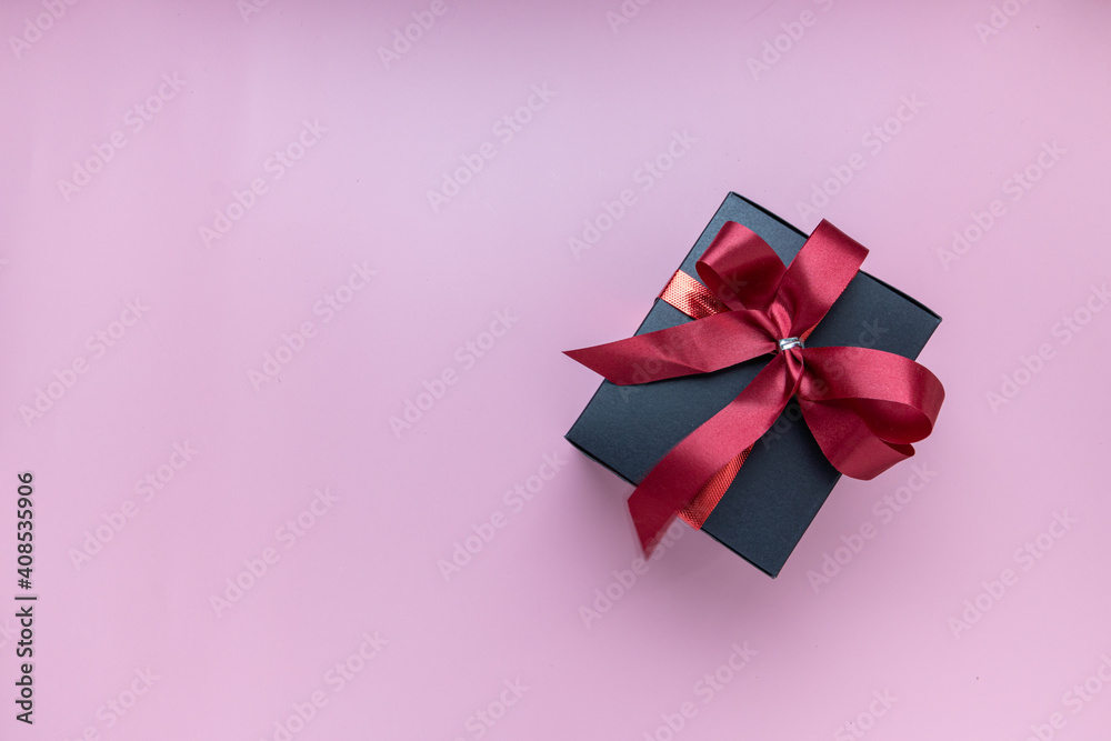 Gift or present box on pink background. for banner. The concept of Valentine Day. top view, copy space
