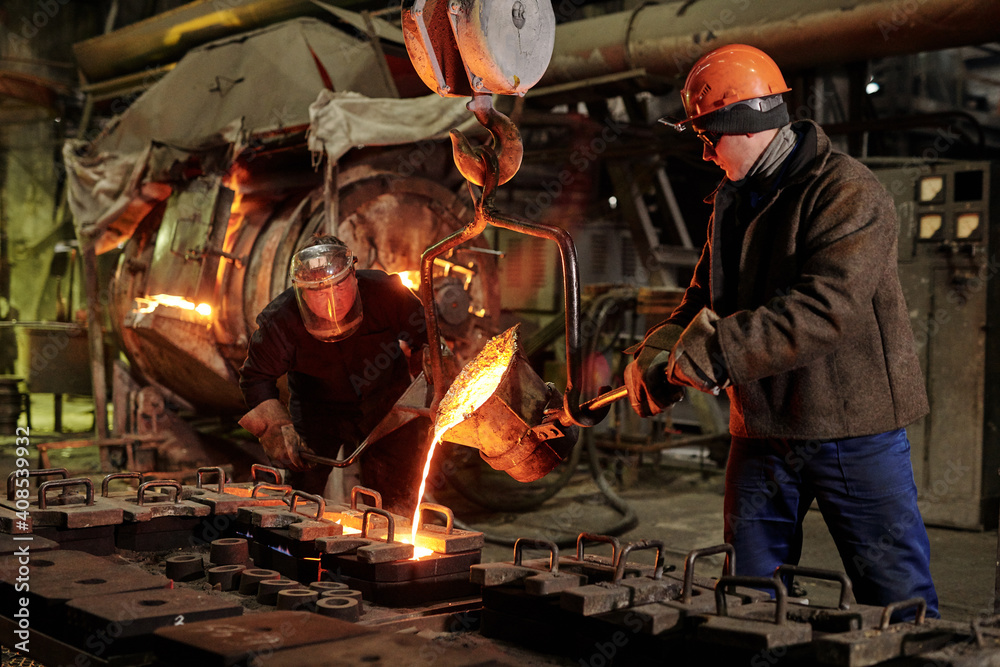 Worker melting iron Worker melting iron